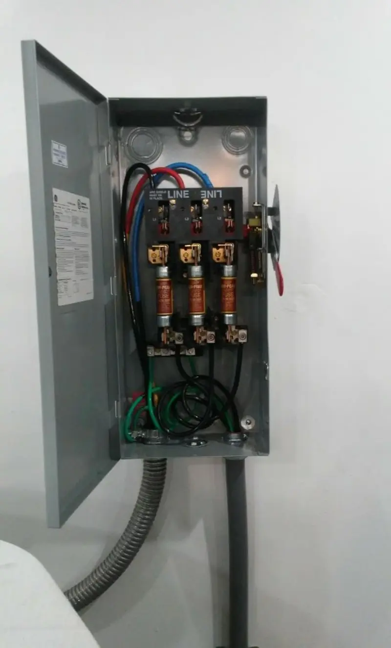 Three-phase disconnect switch installed for Smoke Detector Installation in Swanton